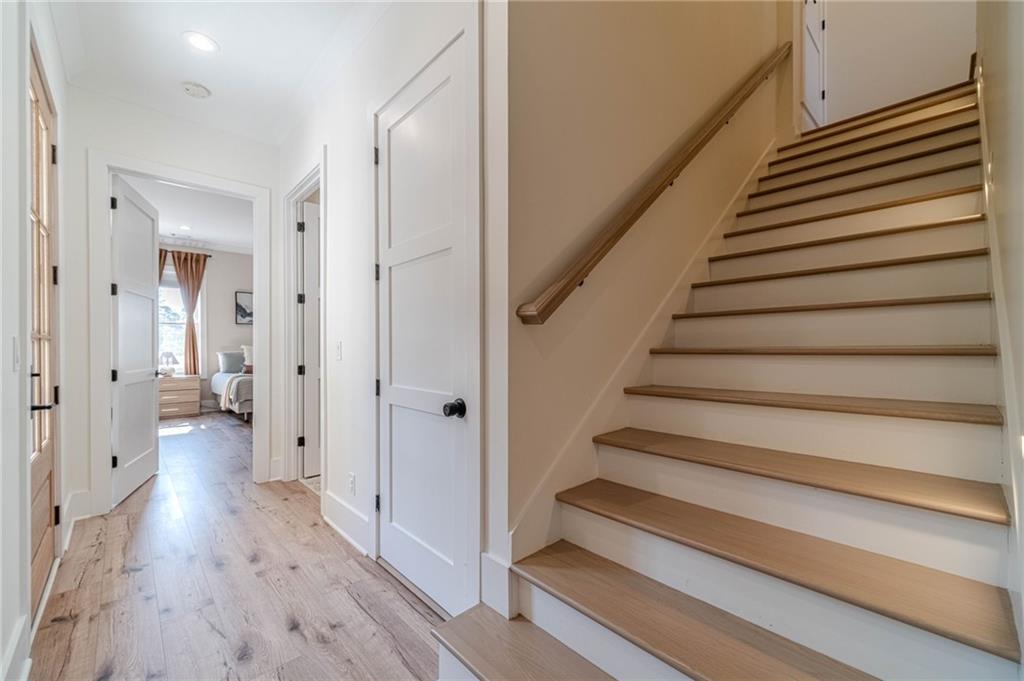 1009 Easy Street Winder, GA 30680 - Photo 27 of 78 a view of a hallway with wooden floor and entryway