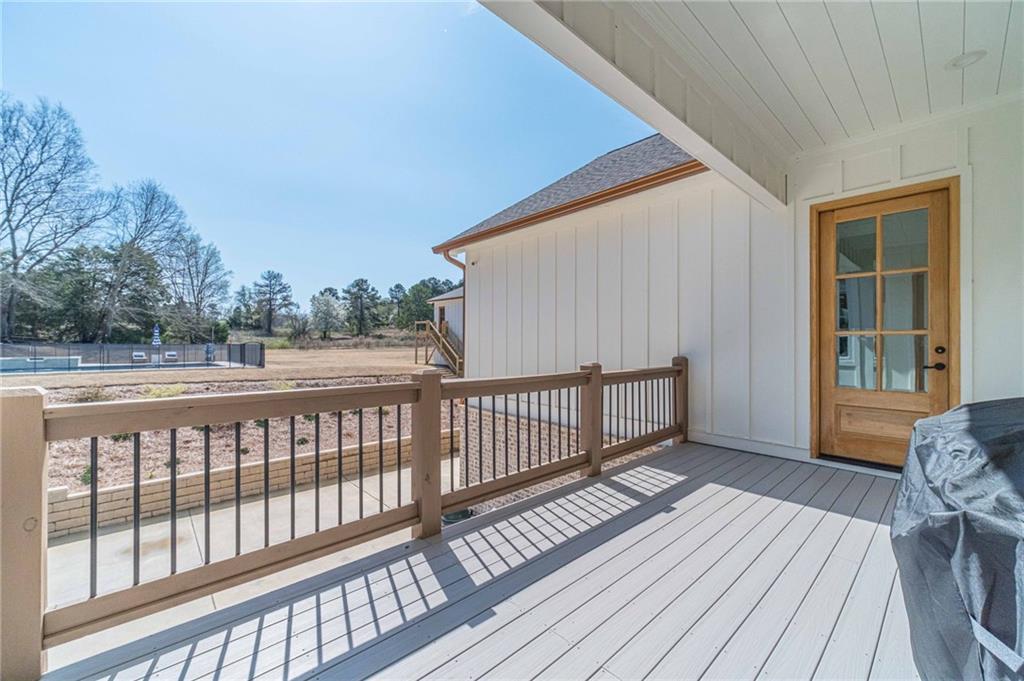 1009 Easy Street Winder, GA 30680 - Photo 36 of 78 a view of a wooden deck with a yard