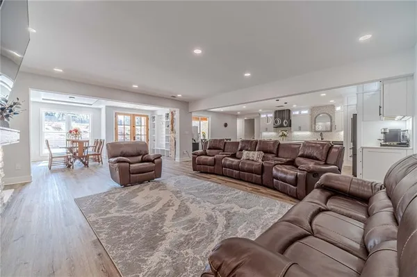a view of swimming pool with outdoor seating