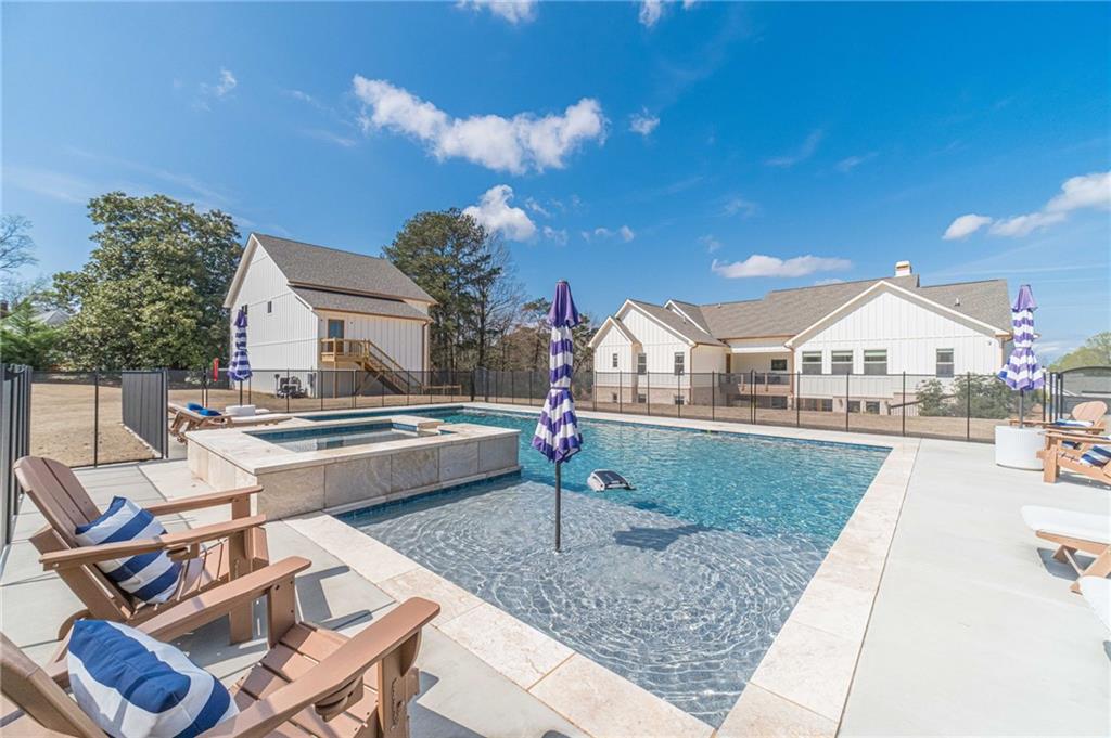 1009 Easy Street Winder, GA 30680 - Photo 56 of 78 a view of a house with swimming pool