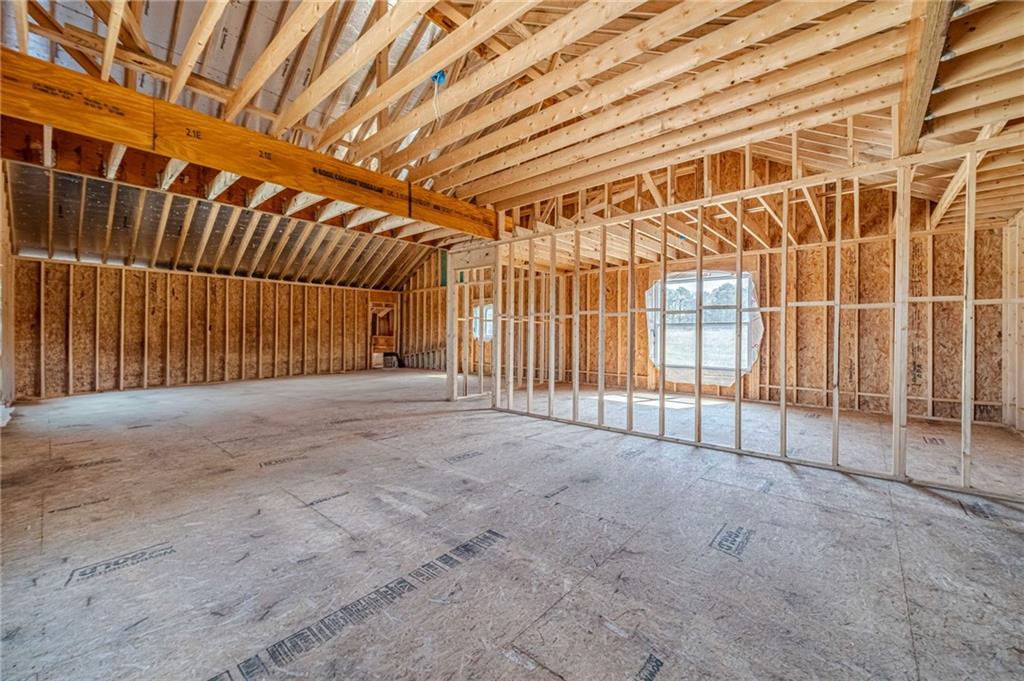 1009 Easy Street Winder, GA 30680 - Photo 64 of 78 a view of an empty room with wooden walls