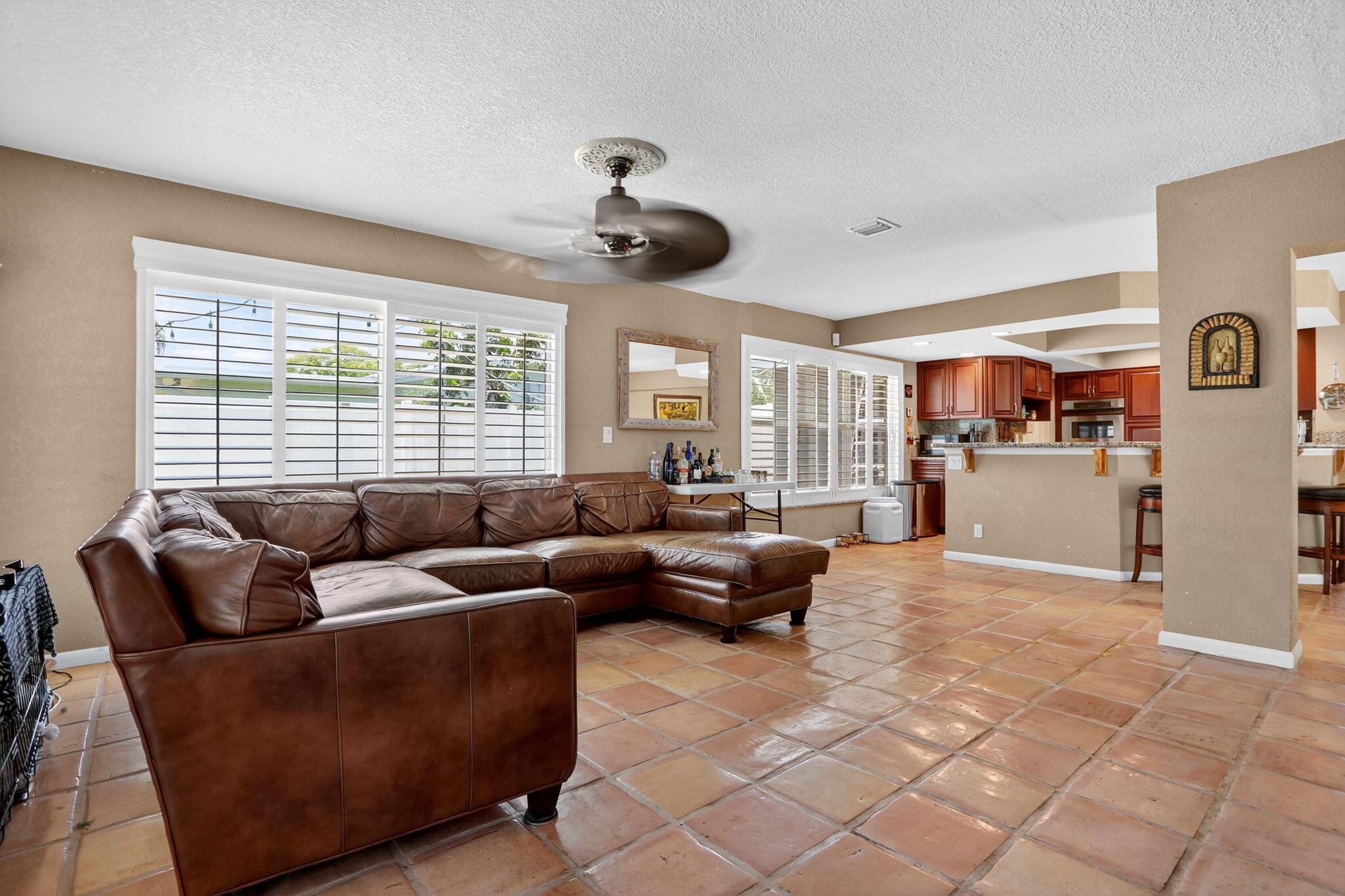 1960 Northeast 31st Street Lighthouse Point, FL 33064 - Photo 12 of 27 a living room with furniture and a large window