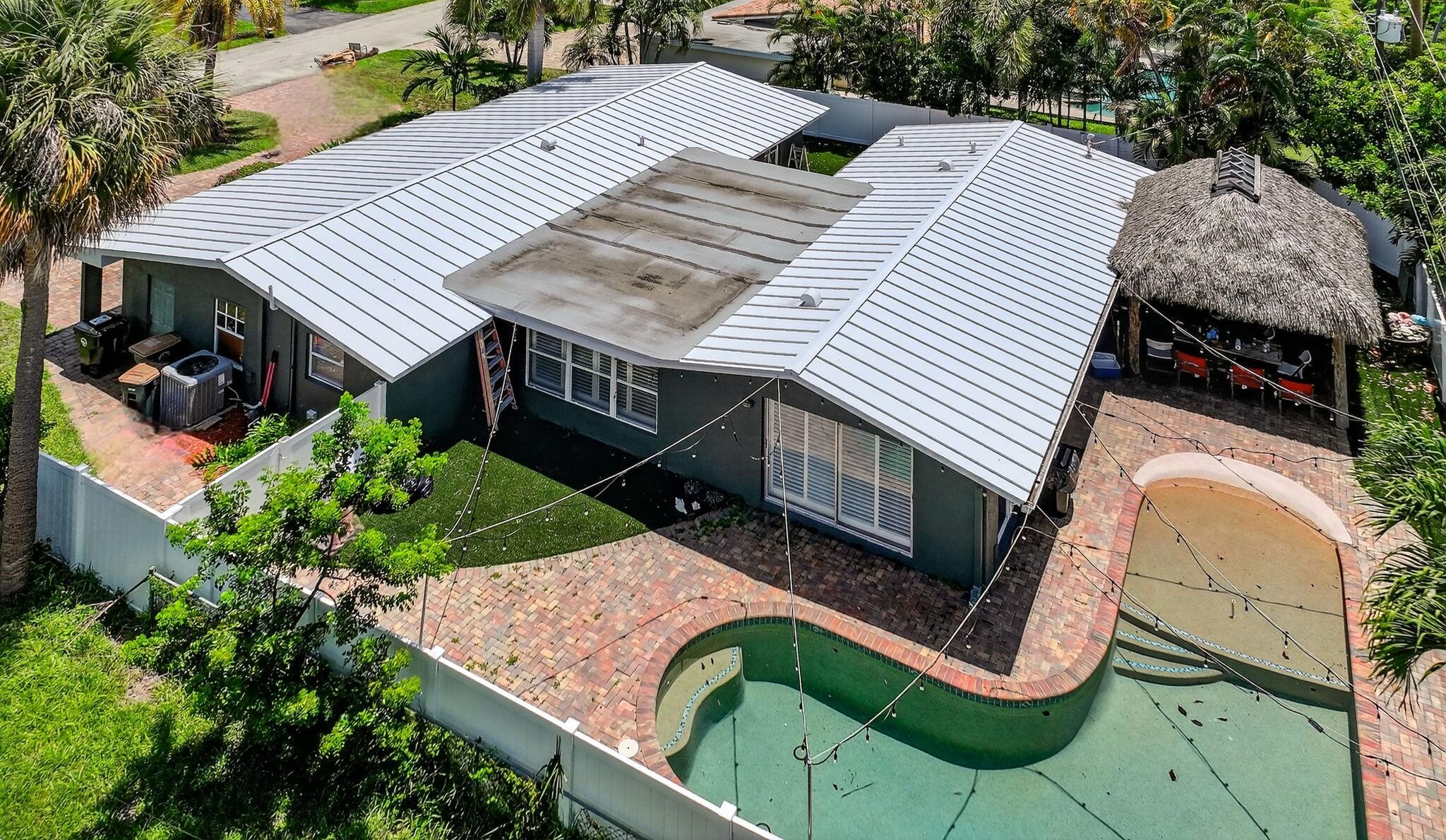 1960 Northeast 31st Street Lighthouse Point, FL 33064 - Photo 21 of 27 an aerial view of a house with swimming pool and porch