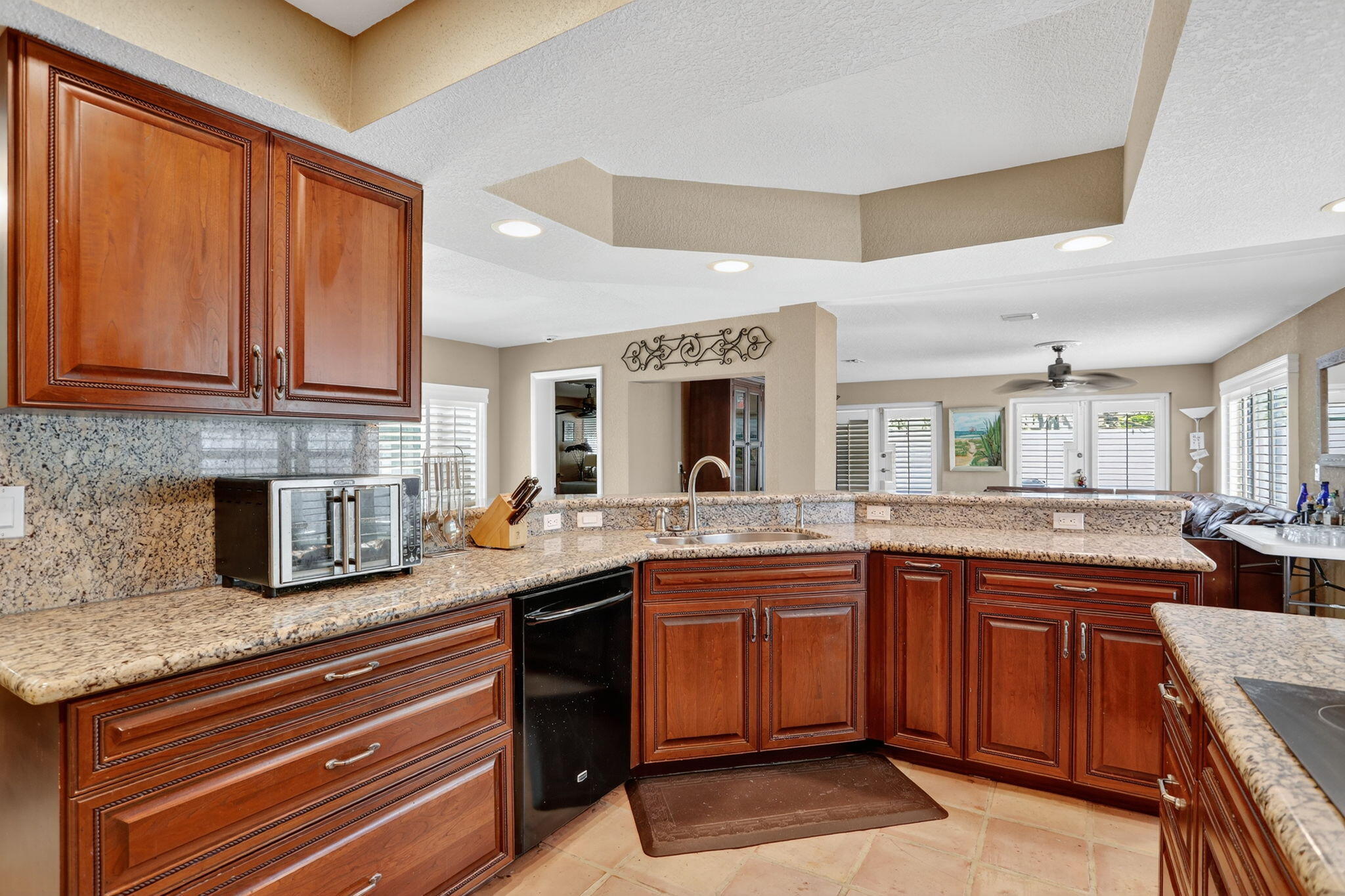 1960 Northeast 31st Street Lighthouse Point, FL 33064 - Photo 4 of 27 a kitchen with lots of counter space and a sink