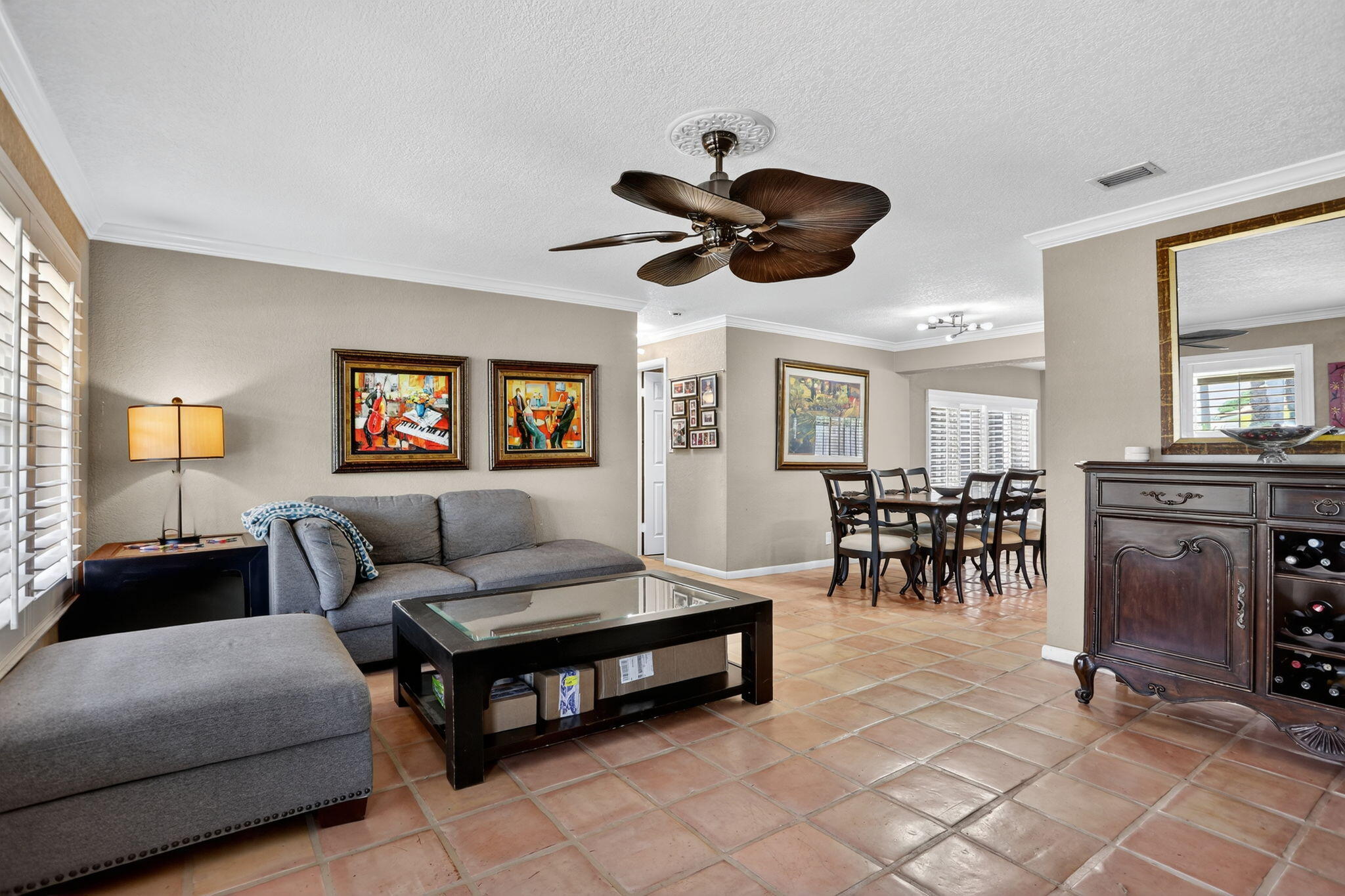 1960 Northeast 31st Street Lighthouse Point, FL 33064 - Photo 8 of 27 a living room with furniture and a flat screen tv
