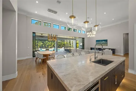 a bed room with a bed and a chair