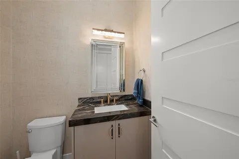 a view of a backyard with patio