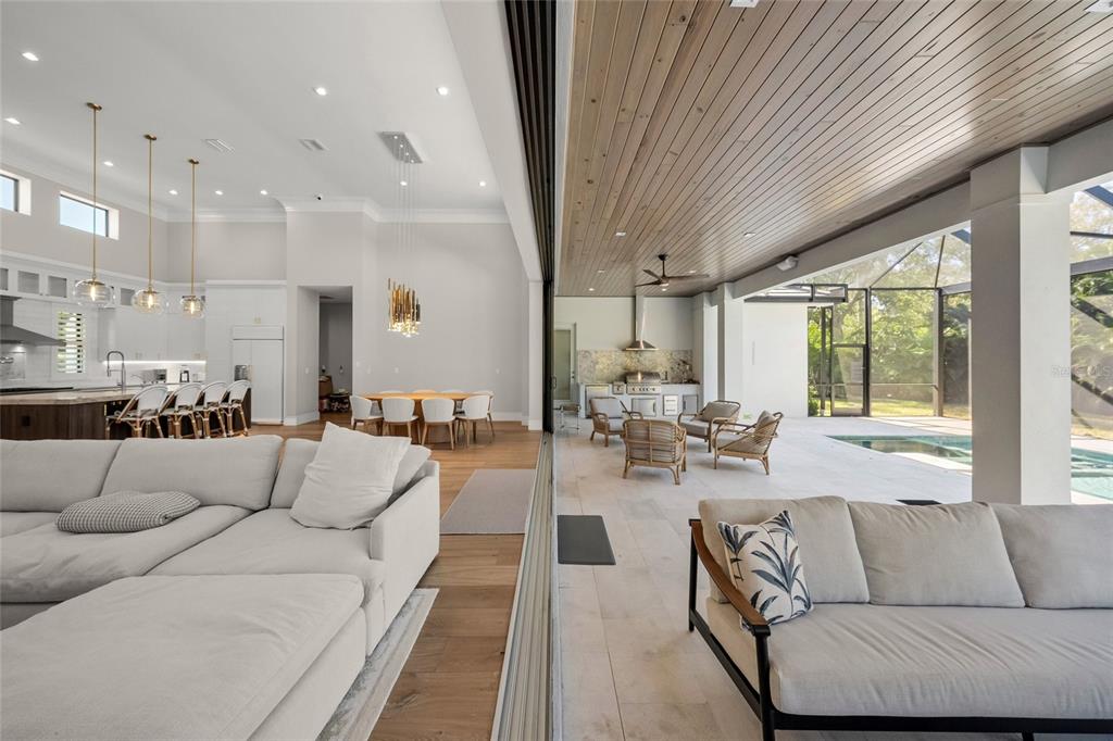 4050 Camino Real Sarasota, FL 34231 - Photo 39 of 59 a living room with furniture and a large window