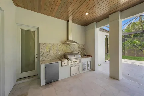 an aerial view of a house with a garden