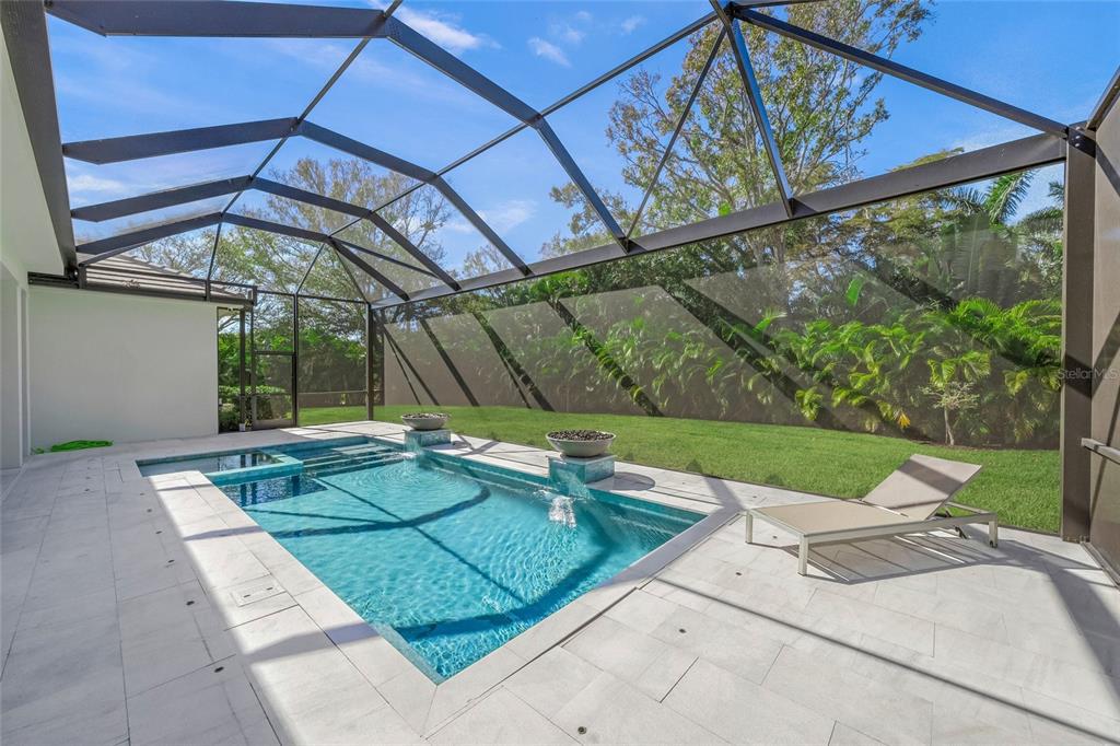 4050 Camino Real Sarasota, FL 34231 - Photo 44 of 59 a view of yard with patio