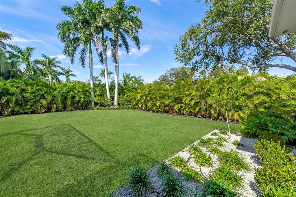 4050 Camino Real Sarasota, FL 34231 - Photo 45 of 59 a view of a garden with a tree