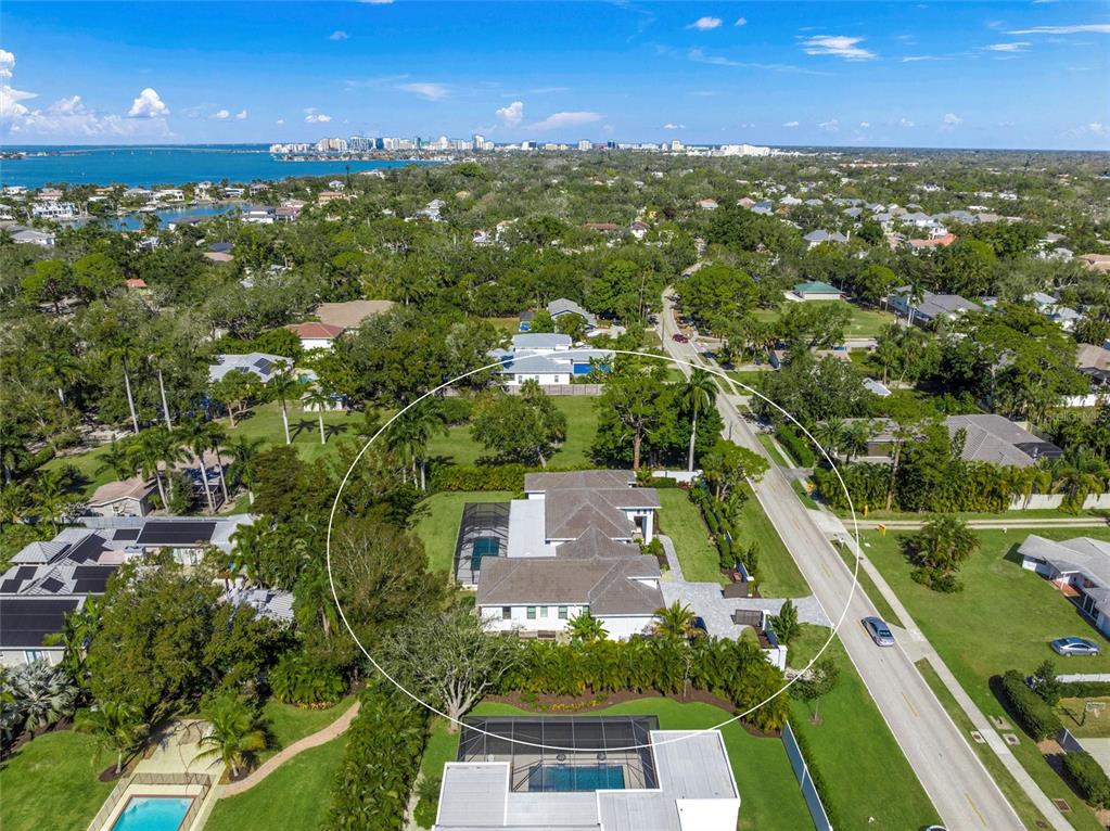 4050 Camino Real Sarasota, FL 34231 - Photo 47 of 59 an aerial view of residential houses with outdoor space and trees