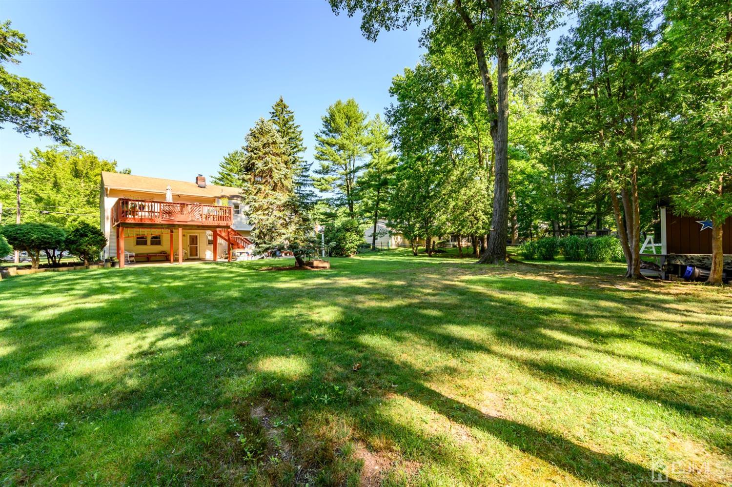 8 Warwick Road Edison, NJ 08820 - Photo 14 of 51 a view of a house with a big yard