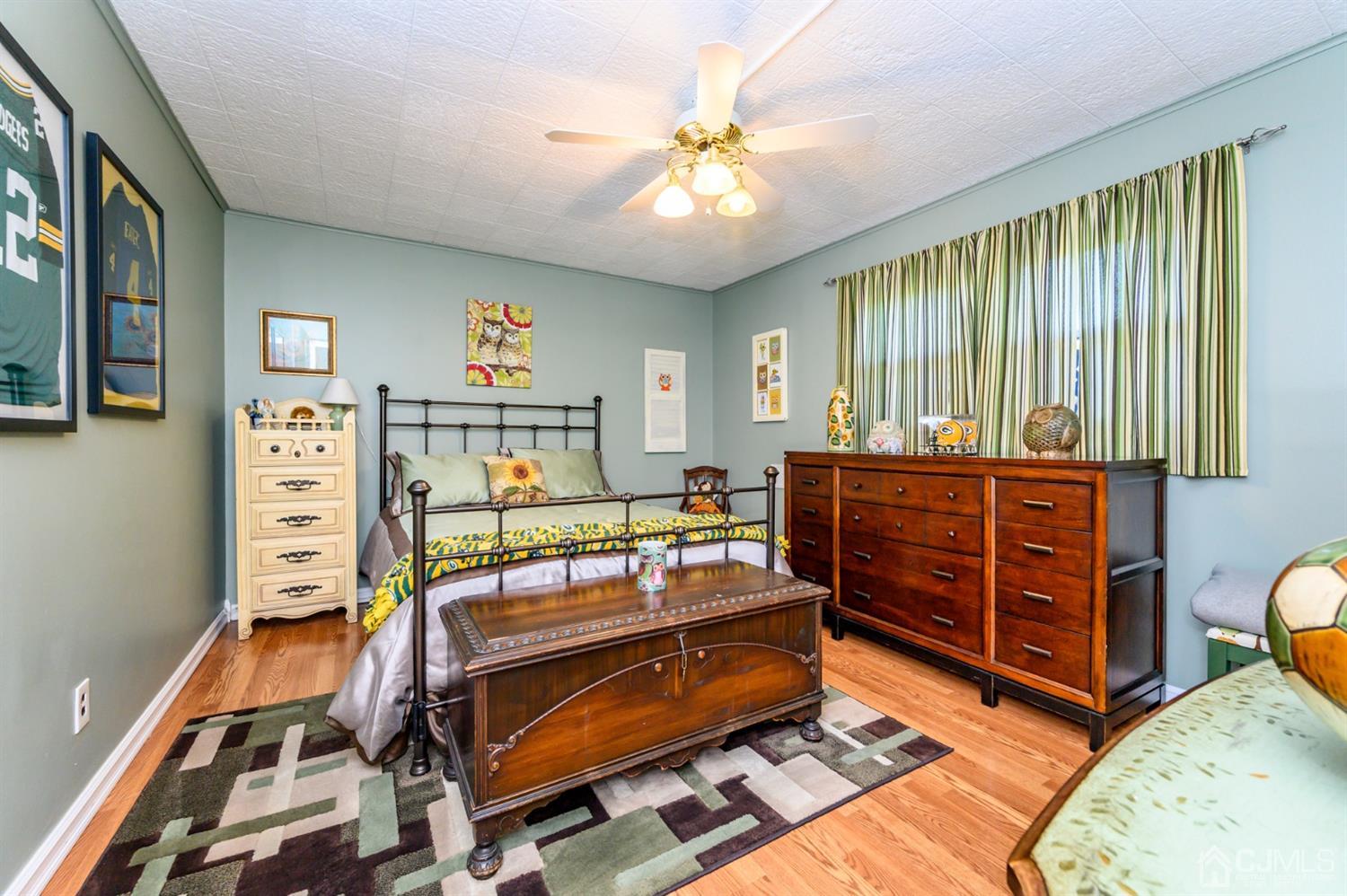 8 Warwick Road Edison, NJ 08820 - Photo 22 of 51 a bedroom with furniture and a window