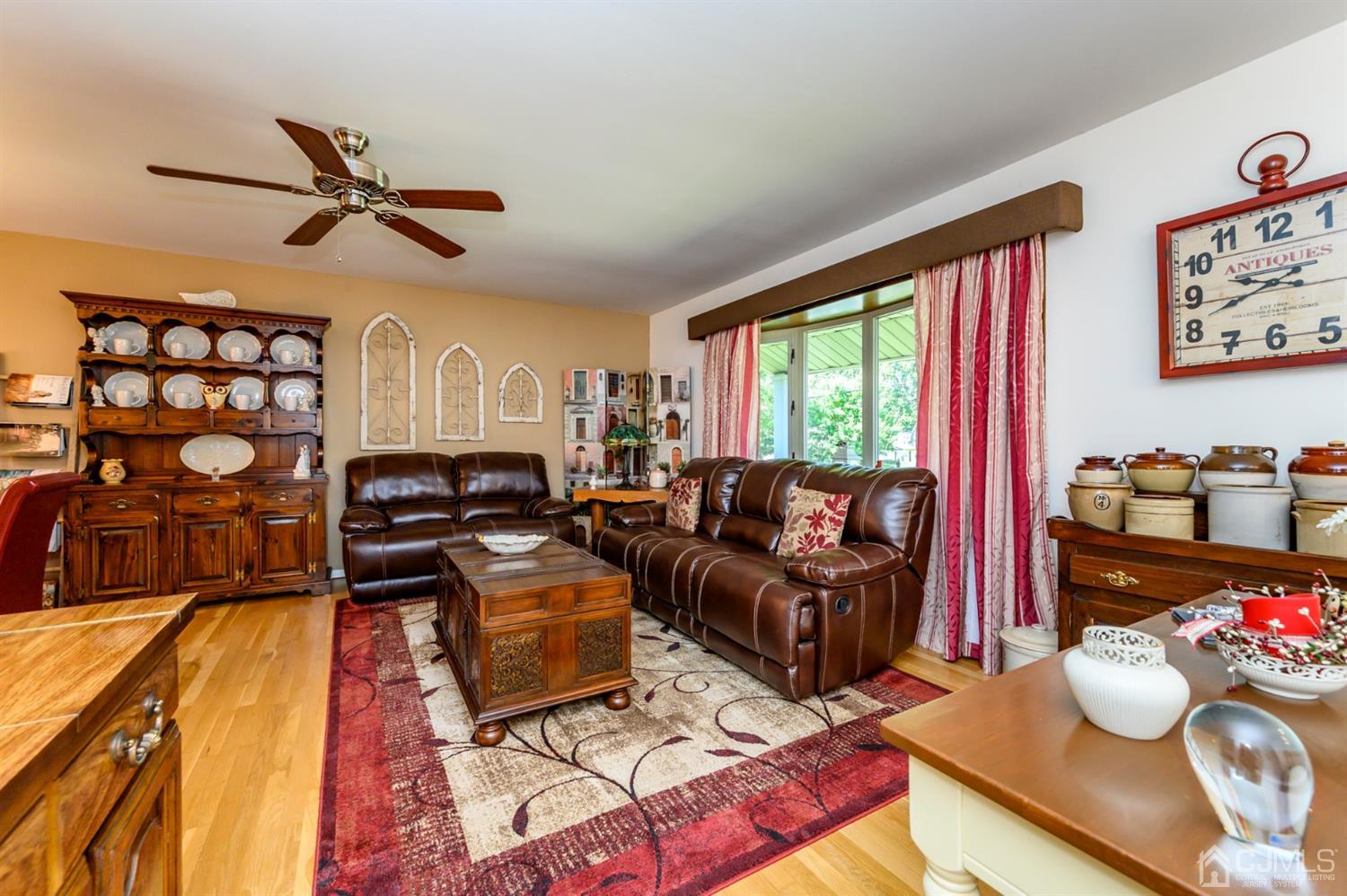 8 Warwick Road Edison, NJ 08820 - Photo 31 of 51 a living room with furniture and a window