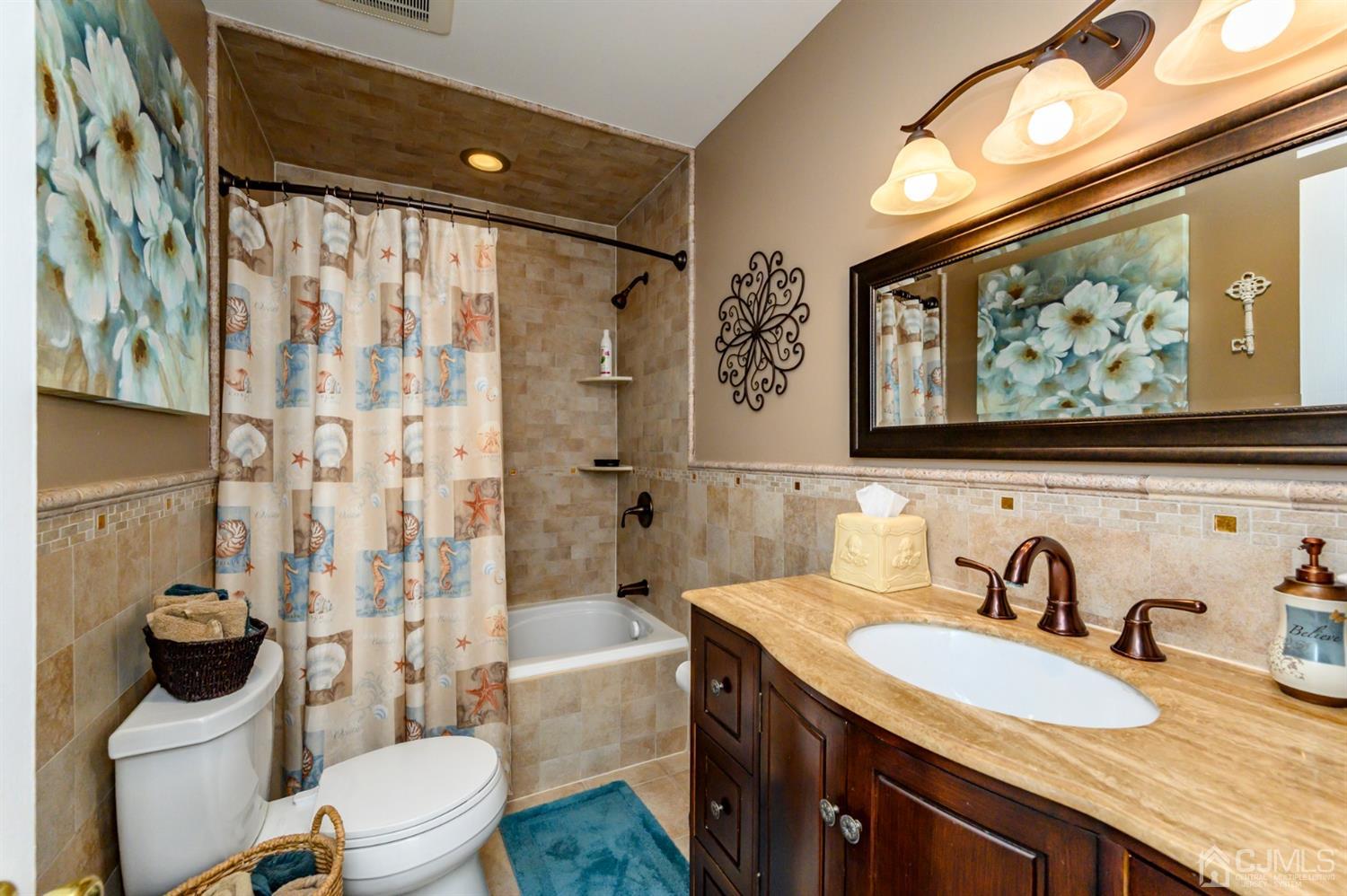 8 Warwick Road Edison, NJ 08820 - Photo 43 of 51 a bathroom with a granite countertop sink mirror vanity and toilet
