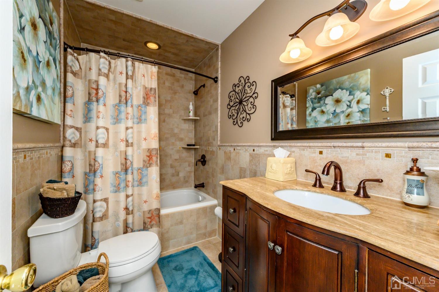 8 Warwick Road Edison, NJ 08820 - Photo 44 of 51 a bathroom with a granite countertop sink toilet and shower