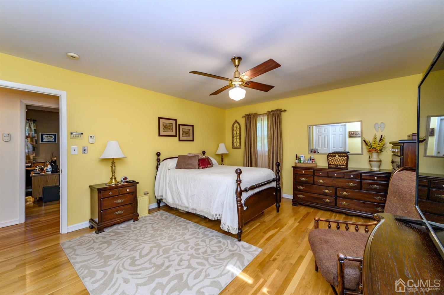 8 Warwick Road Edison, NJ 08820 - Photo 46 of 51 a bed room with a bed and a couch