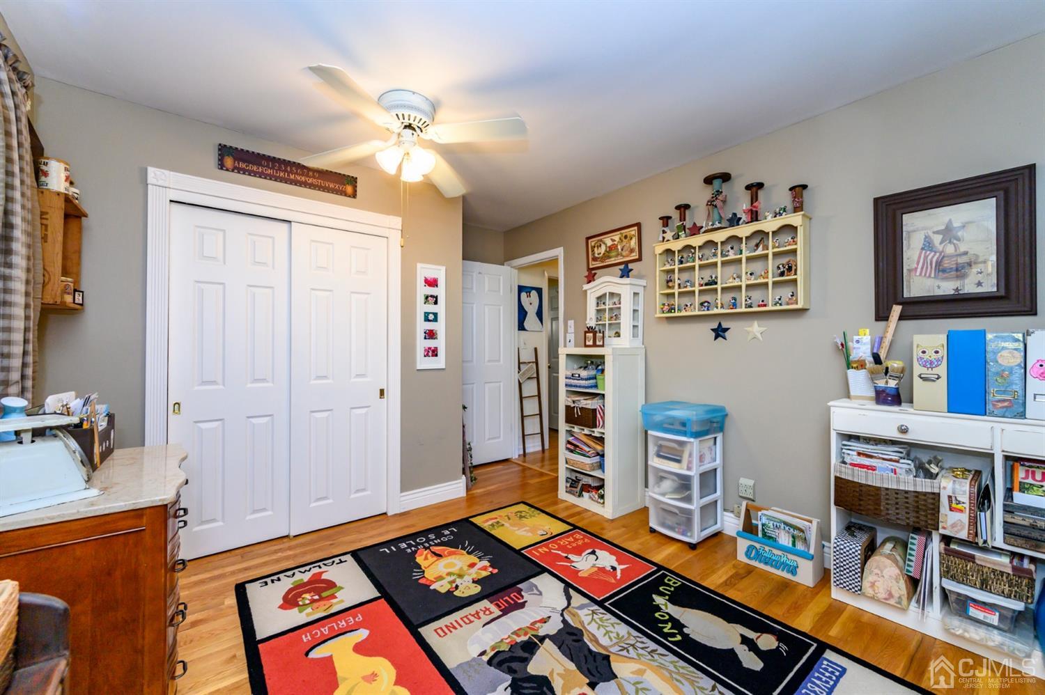 8 Warwick Road Edison, NJ 08820 - Photo 48 of 51 a room with furniture and a baby crib