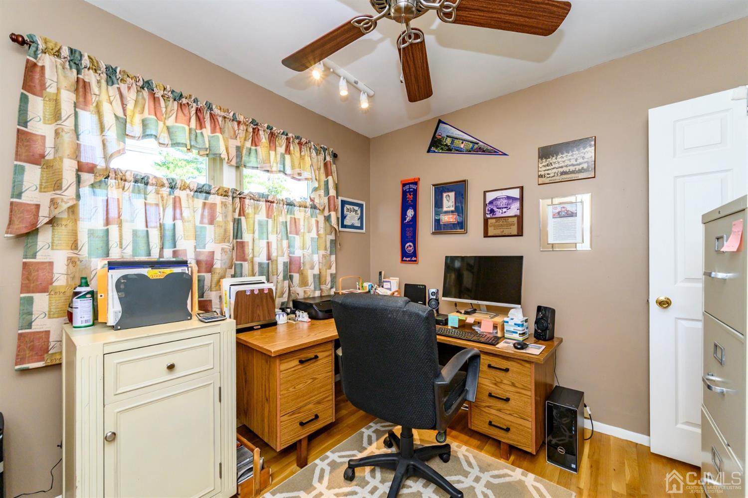 8 Warwick Road Edison, NJ 08820 - Photo 49 of 51 a view of a workspace with furniture and a window