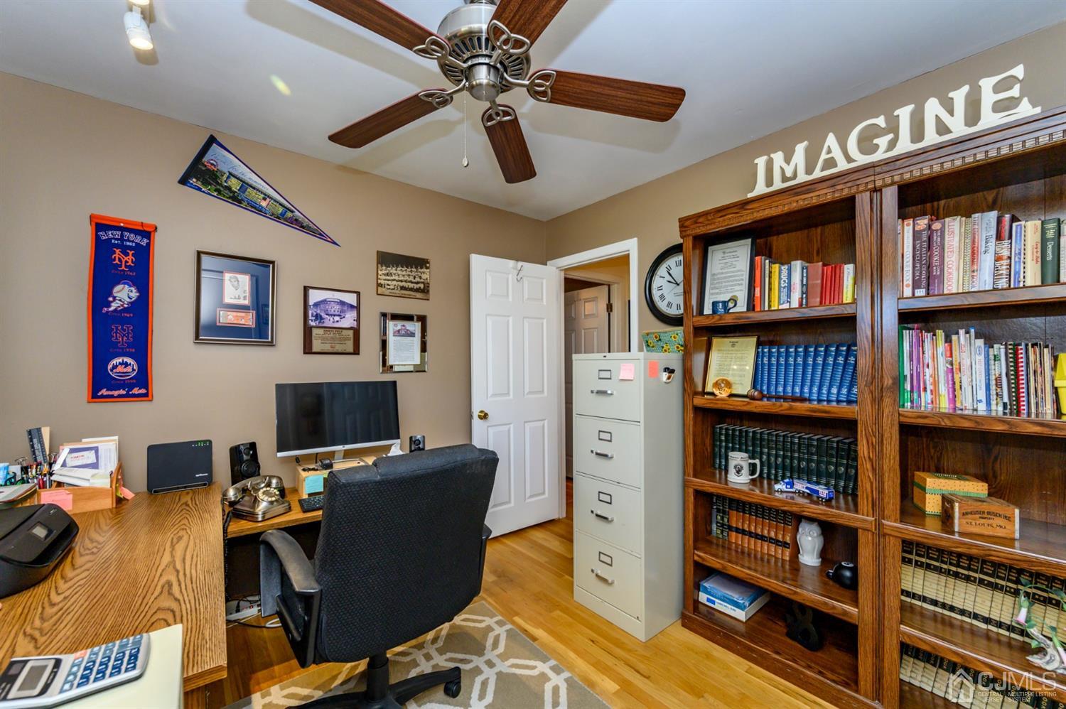 8 Warwick Road Edison, NJ 08820 - Photo 50 of 51 a view of a workspace with bookshelf