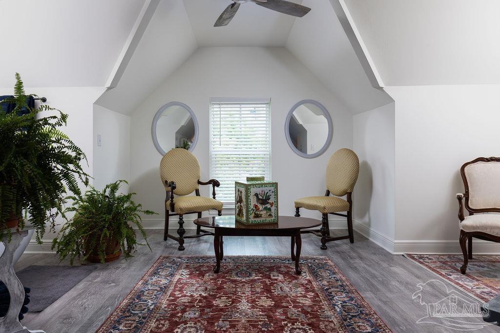 714 East La Rua Street Pensacola, FL 32501 - Photo 27 of 63 a living room with furniture and a potted plant