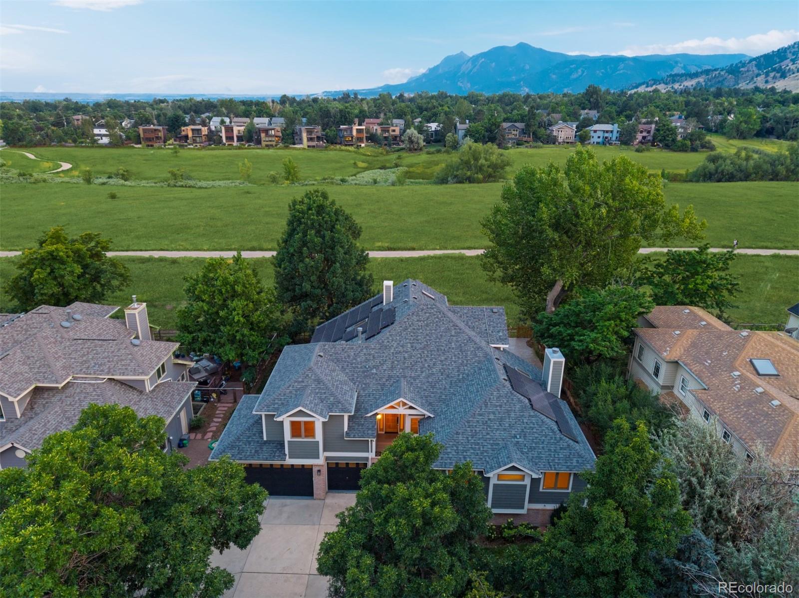 990 Utica Circle Boulder, CO 80304 - Photo 2 of 48 an aerial view of a house with a garden