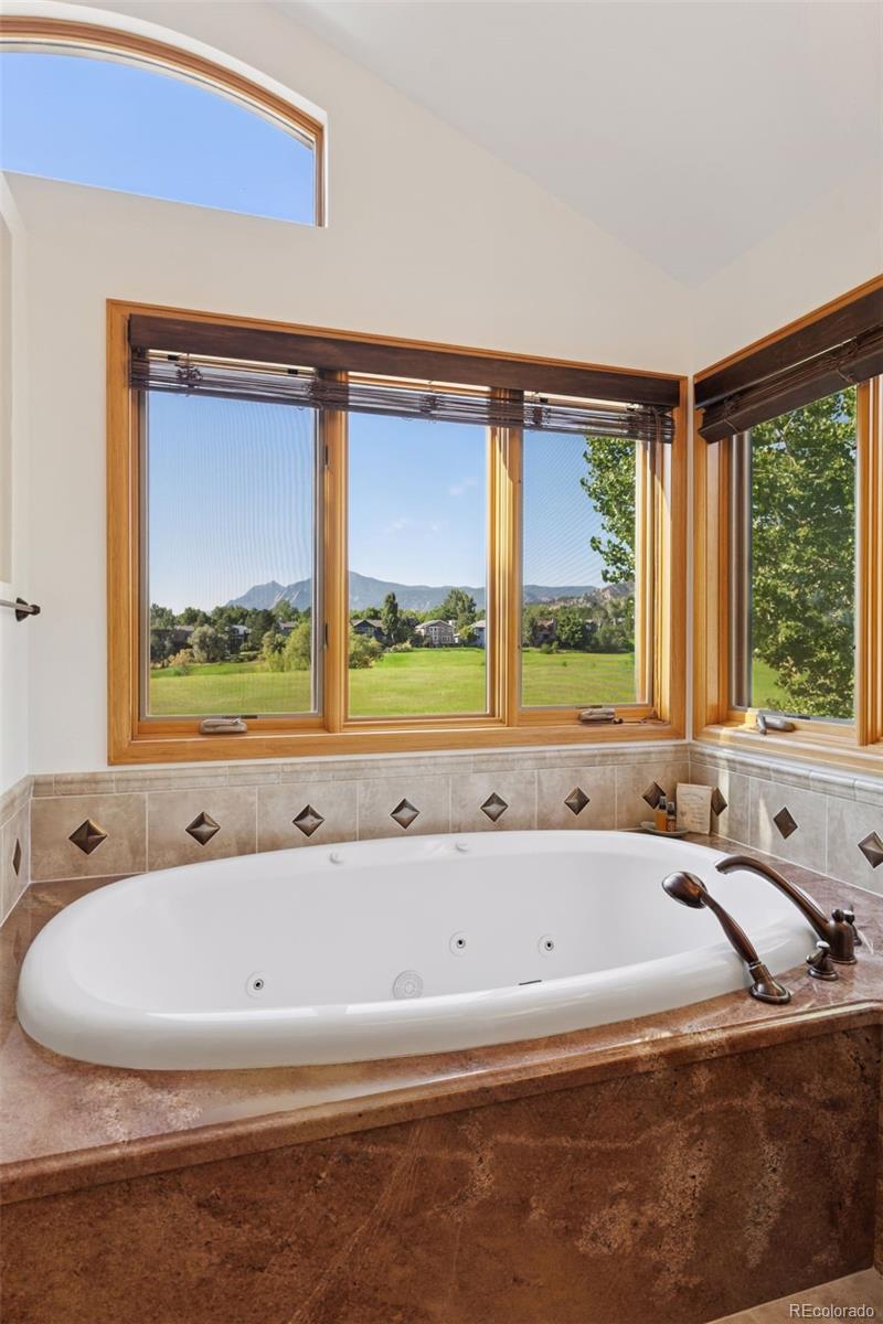 990 Utica Circle Boulder, CO 80304 - Photo 29 of 48 a bath tub sitting next to a window