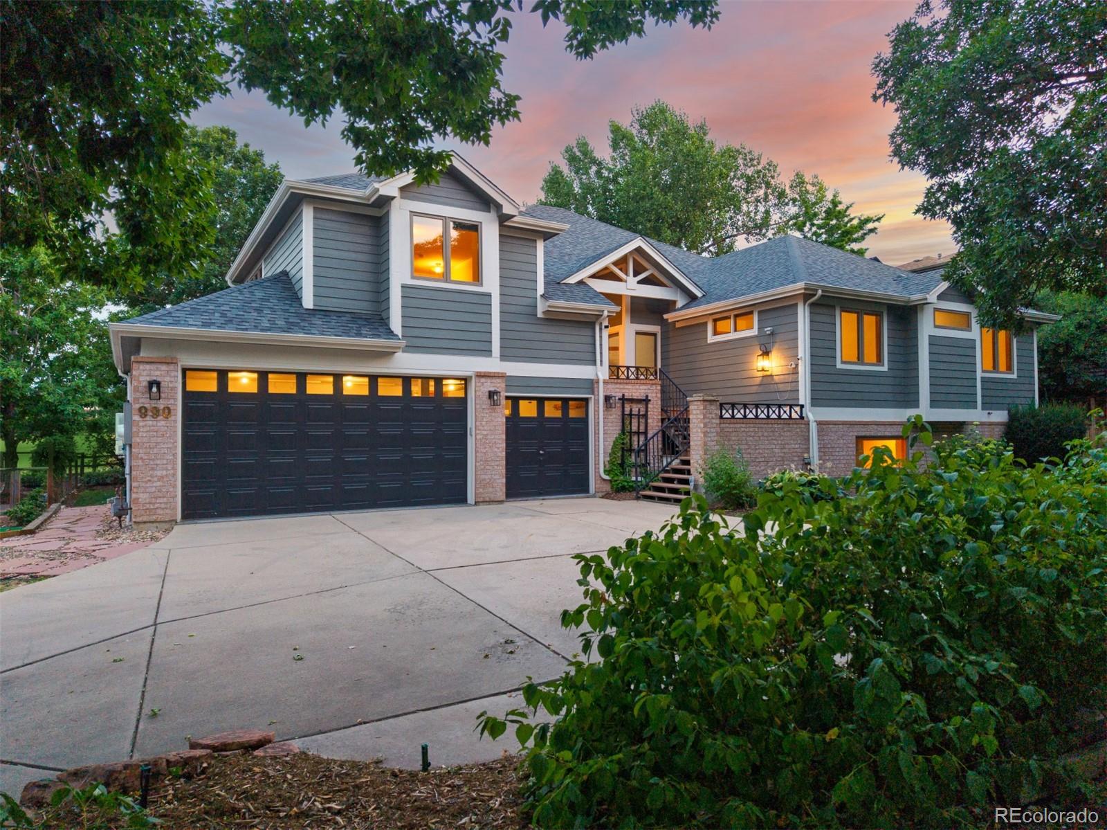 990 Utica Circle Boulder, CO 80304 - Photo 3 of 48 a front view of a house with garage