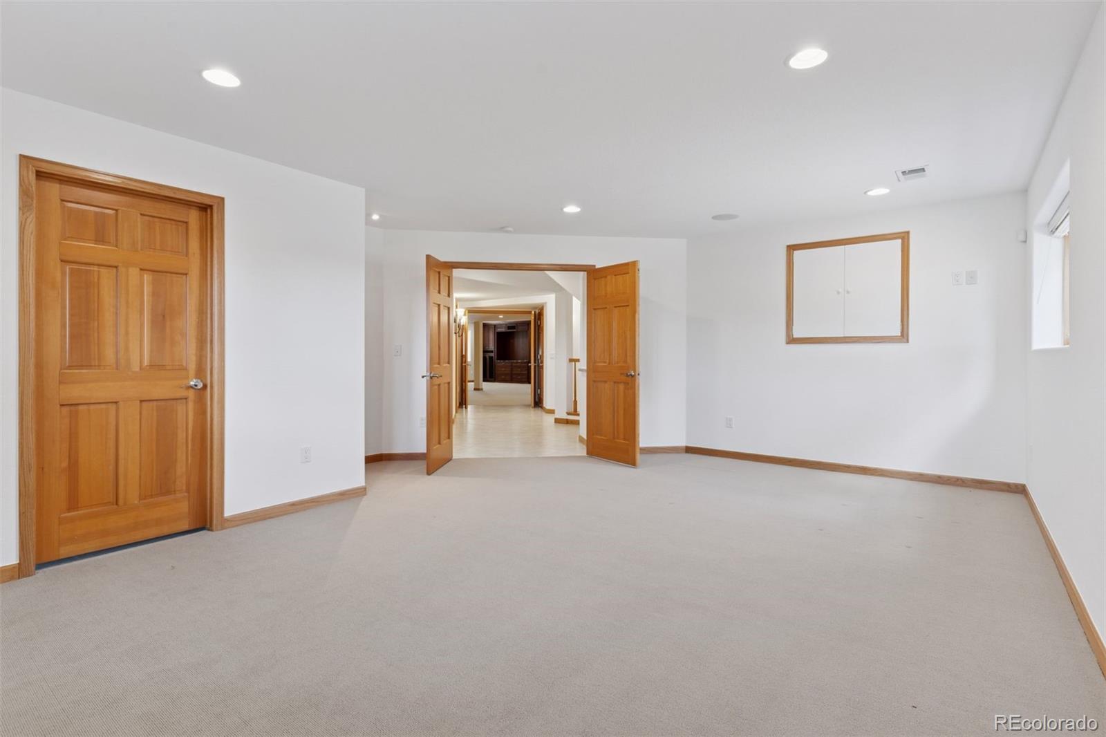 990 Utica Circle Boulder, CO 80304 - Photo 31 of 48 an empty room with windows