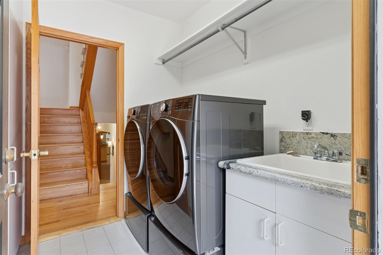 990 Utica Circle Boulder, CO 80304 - Photo 34 of 48 a utility room with dryer and washer