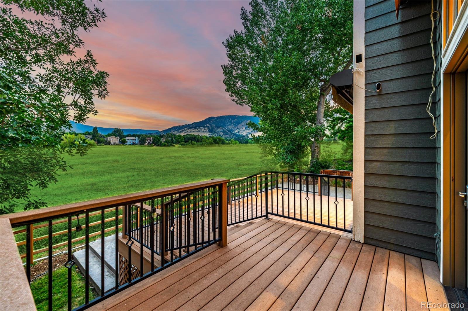 990 Utica Circle Boulder, CO 80304 - Photo 37 of 48 a view of a wooden roof deck