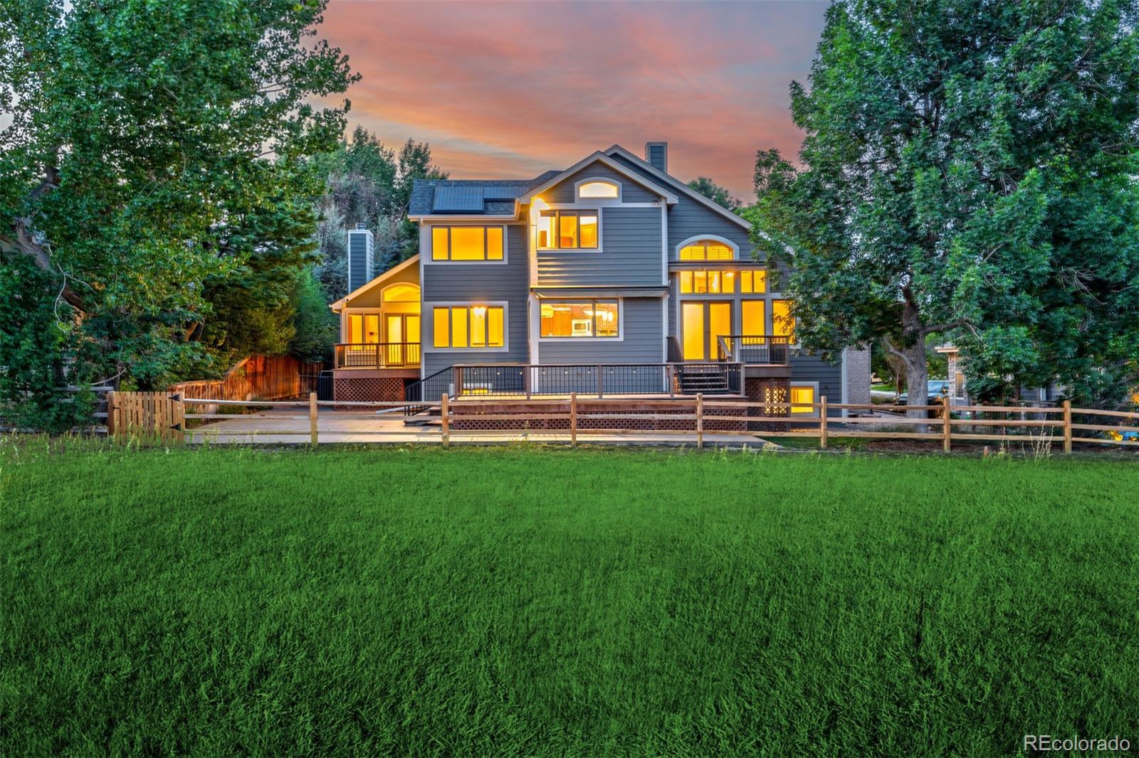 990 Utica Circle Boulder, CO 80304 - Photo 40 of 48 a front view of house with yard and green space