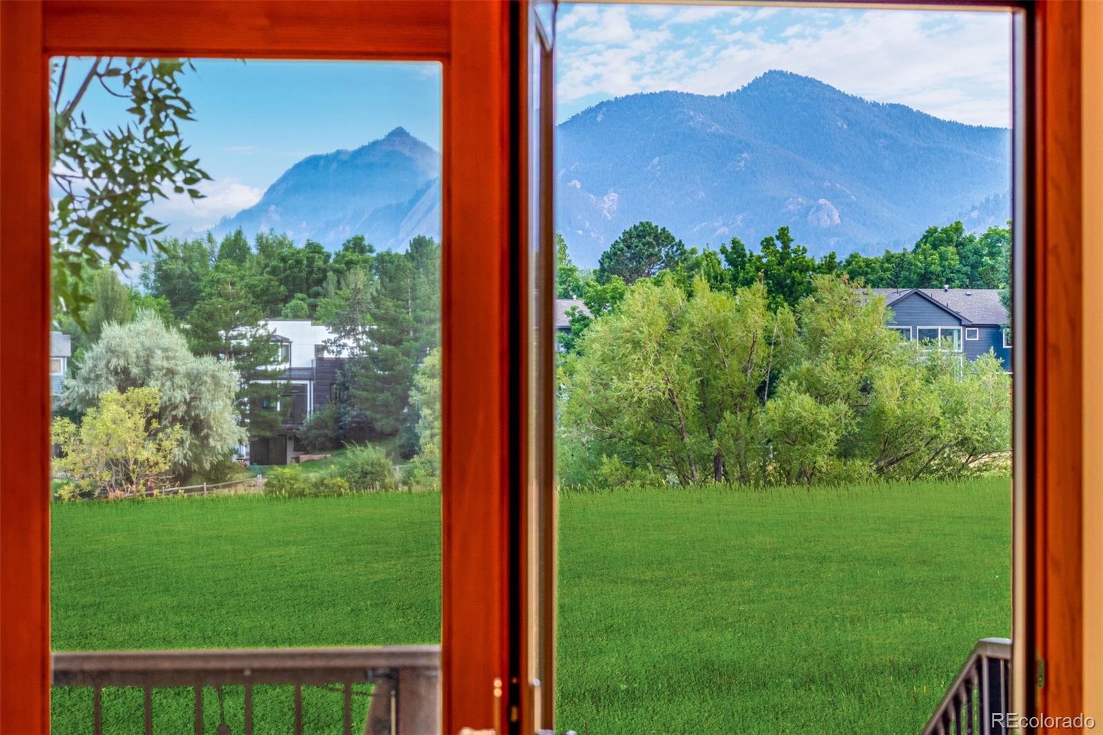 990 Utica Circle Boulder, CO 80304 - Photo 10 of 48 a view of a back yard from a window