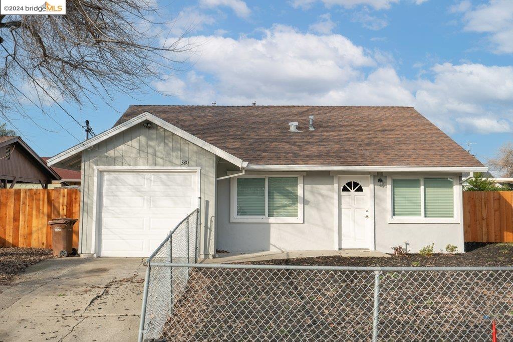 380 Marina Road Bay Point, CA 94565 - Photo 1 of 1 a front view of a house with a yard