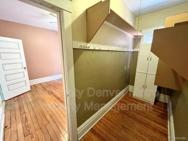 a view of an empty room and window