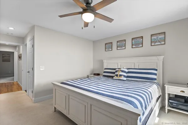 a bathroom with a shower and a sink