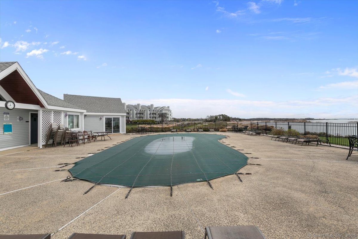 1 Mansfield Grove Road, Unit 206 East Haven, CT 06512 - Photo 32 of 40 a view of a swimming pool with a patio