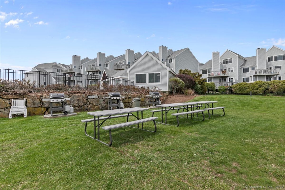 1 Mansfield Grove Road, Unit 206 East Haven, CT 06512 - Photo 35 of 40 a view of houses with outdoor space and lake view