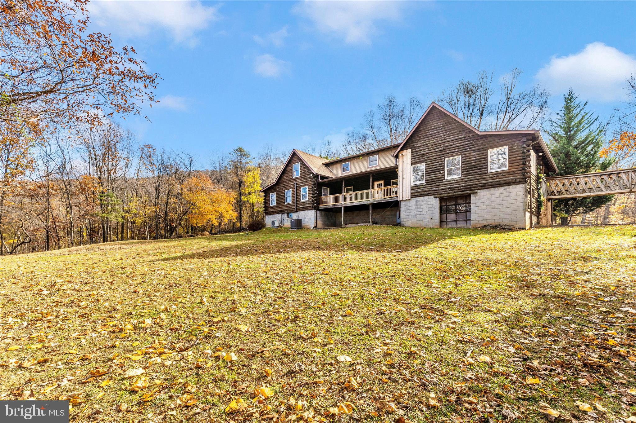1402 Hoffmaster Road Knoxville, MD 21758 - Photo 11 of 54 a front view of a house with a yard