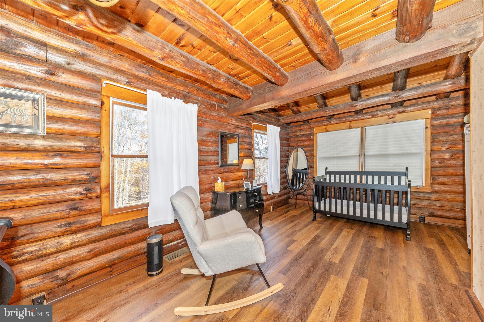 1402 Hoffmaster Road Knoxville, MD 21758 - Photo 18 of 54 a view of a porch with furniture and wooden floor