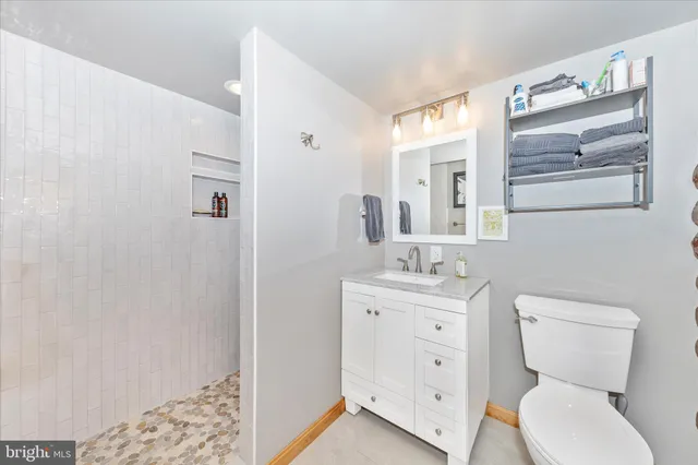 a view of a swimming pool with outdoor seating