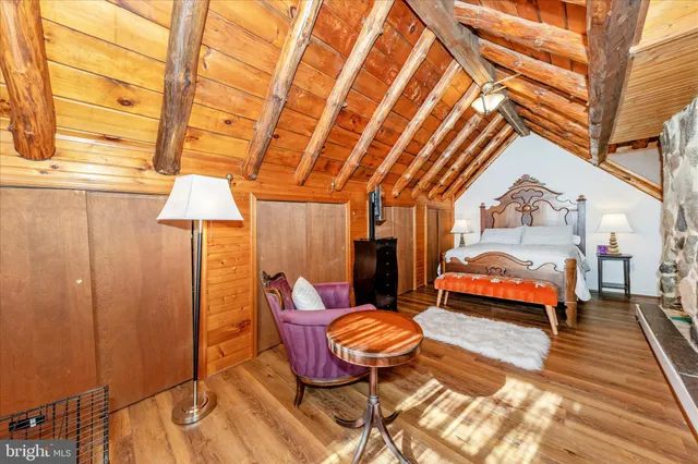 a spacious bathroom with a granite countertop sink and a mirror