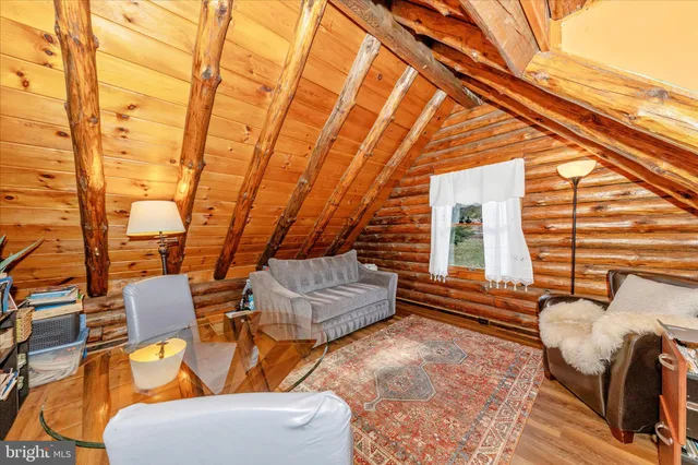 a view of living room kitchen and dining room