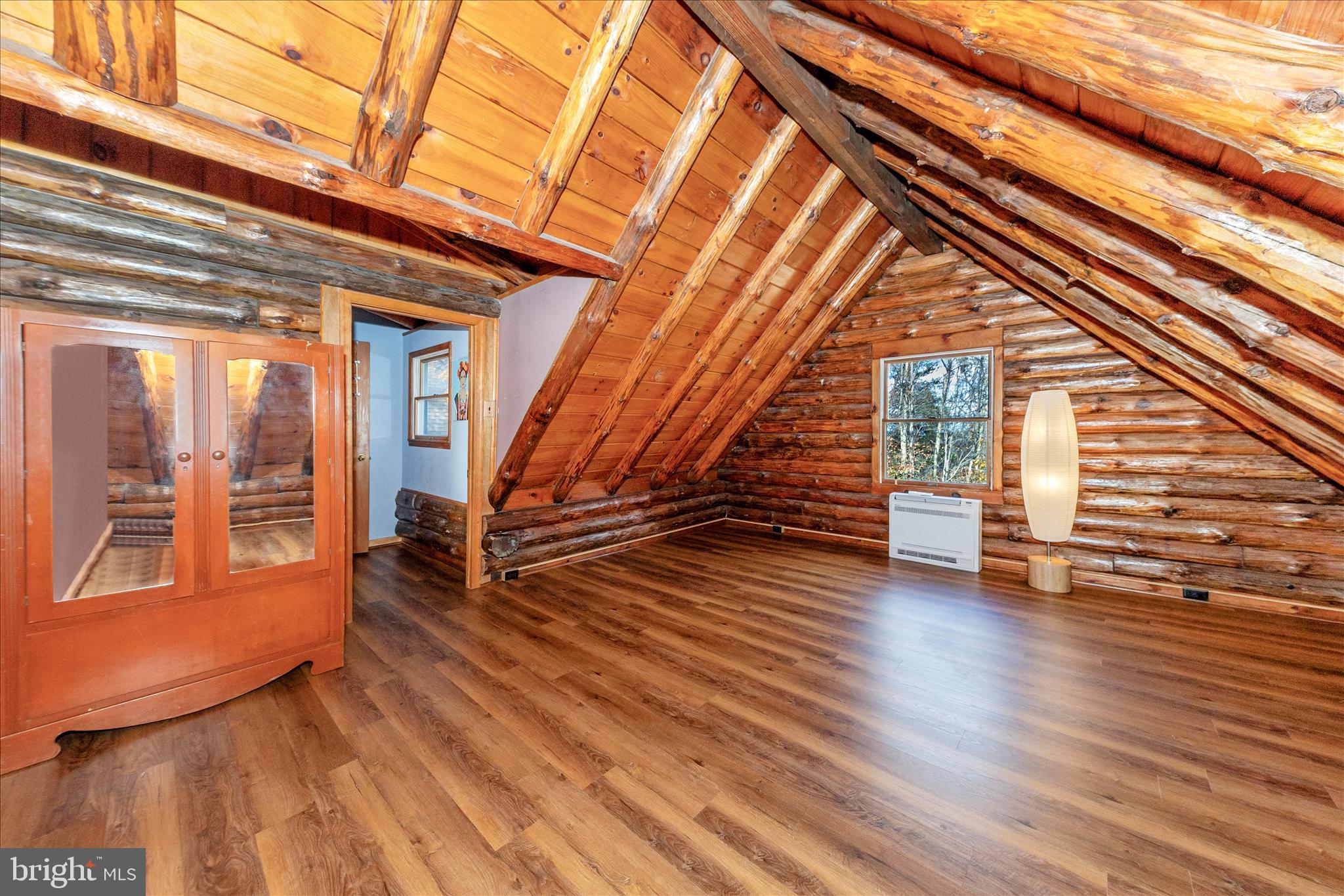 1402 Hoffmaster Road Knoxville, MD 21758 - Photo 31 of 54 a view of an empty room with wooden floor and stairs