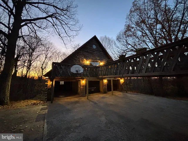 a view of a room with a wooden floor