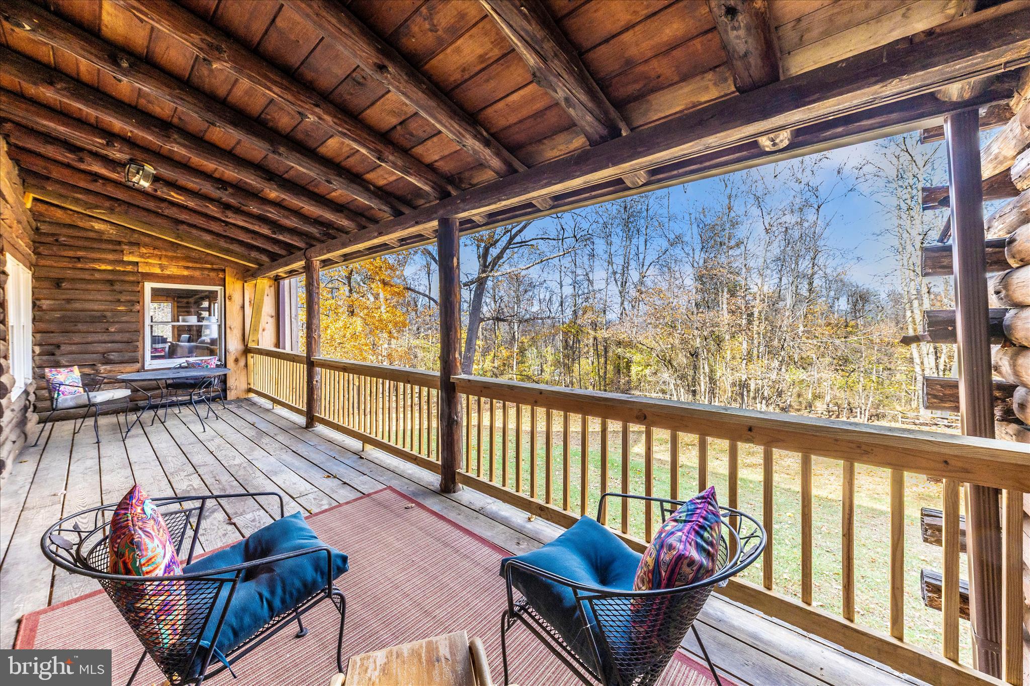 1402 Hoffmaster Road Knoxville, MD 21758 - Photo 10 of 54 a view of a porch with furniture and wooden floor