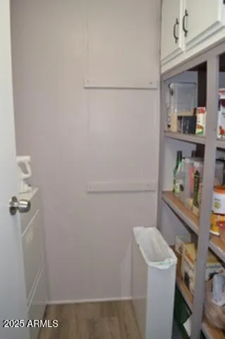 a bathroom with a toilet and shower