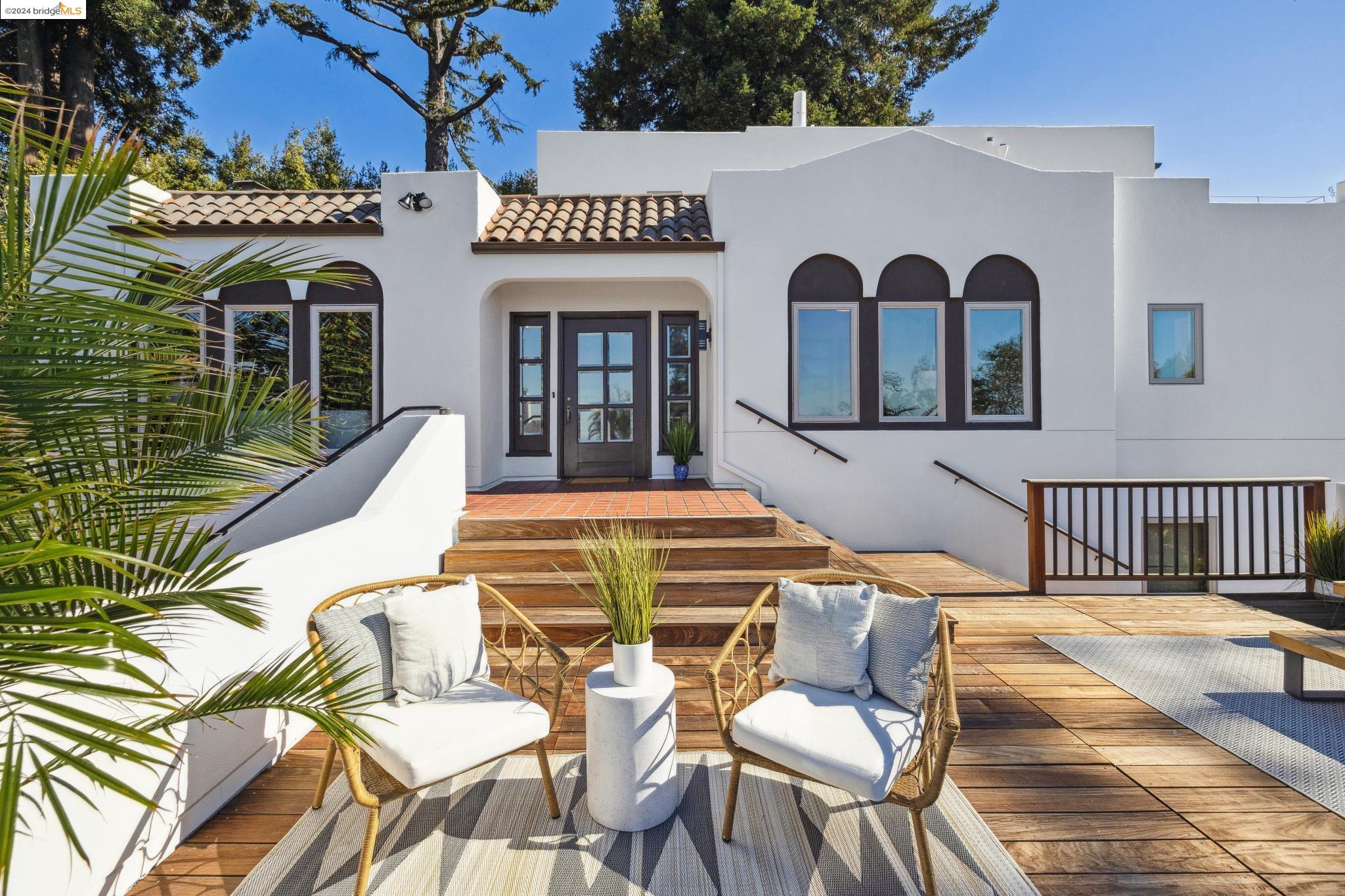 1555 Scenic Avenue Berkeley, CA 94708 - Photo 1 of 1 a view of a house with a lounge chair