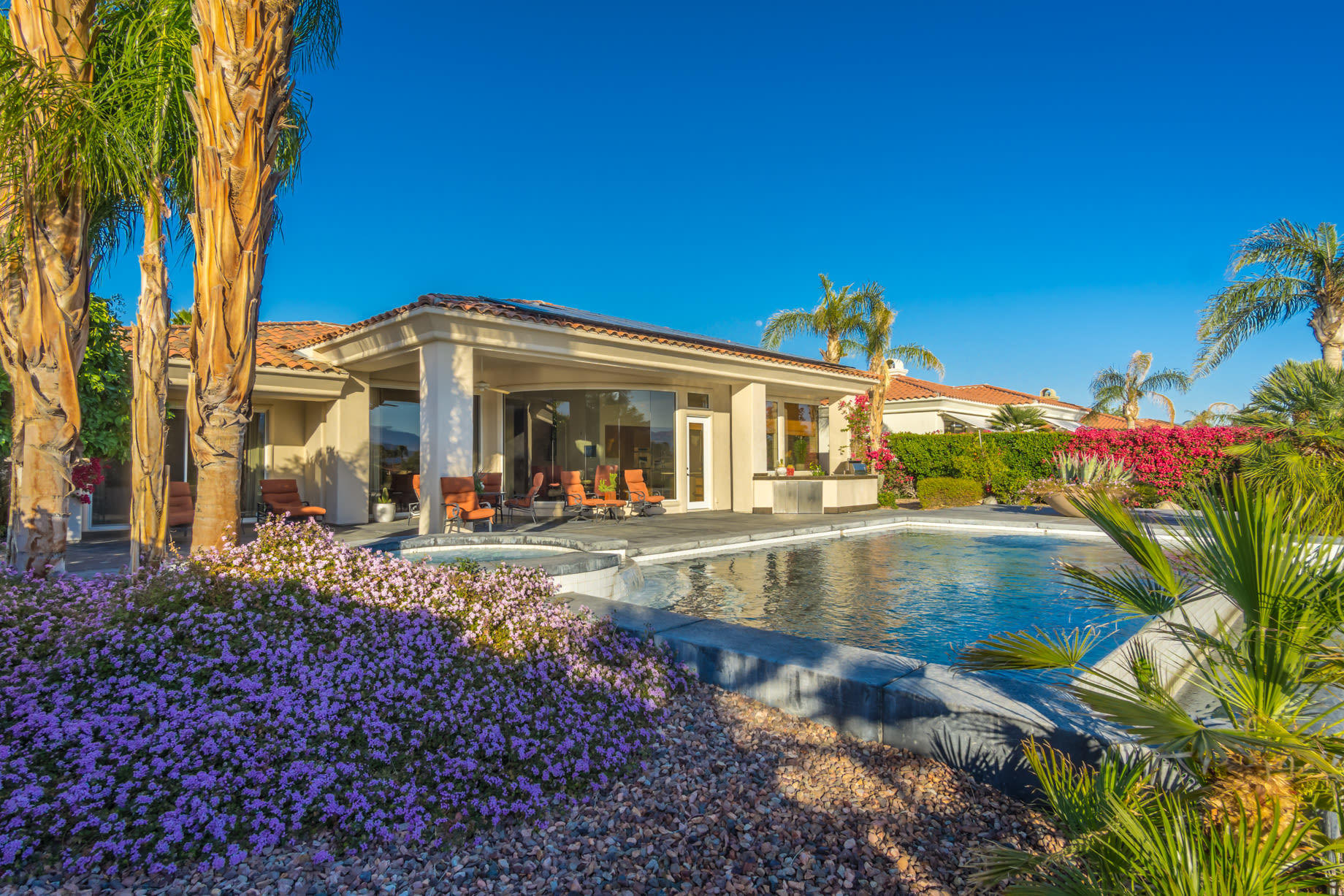 238 Loch Lomond Road Rancho Mirage, CA 92270 - Photo 2 of 44 a view of a house with swimming pool